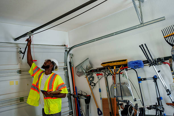 Professional Garage Door Panel Replacement technician working in Trafalgar, IN